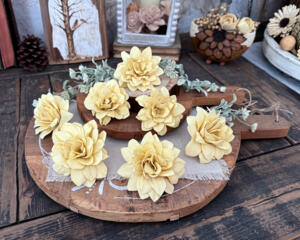 Garden inspired faux wood flower blossoms hand painted in a custom dusty yellow. 